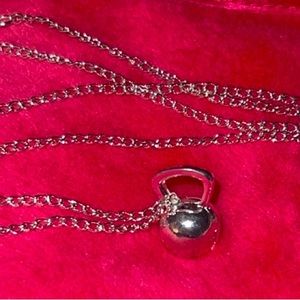 Kettlebell necklace. New in bag.